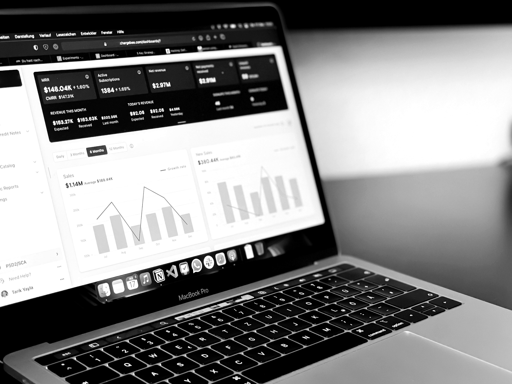 Close-up of a laptop showing business analytics and reporting dashboards.